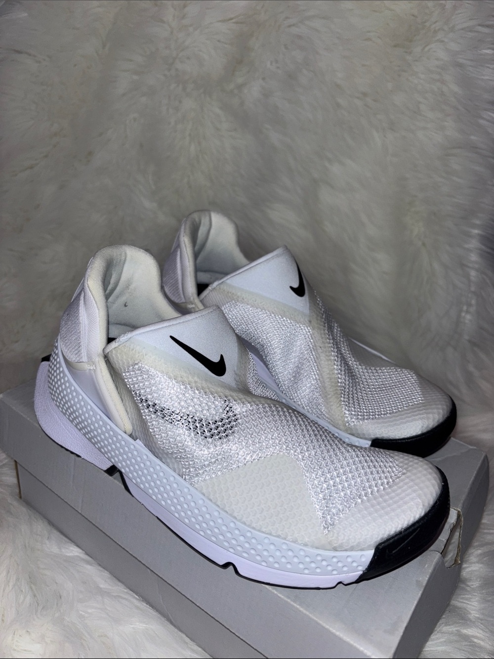 Nike White Slip-On Sneakers with Black Swoosh Accents
